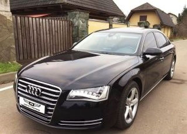 Аренда аренда черного седана audi a8 с водителем с водителем, фото